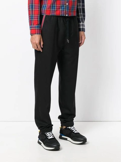 Shop Givenchy Stars And Stripe Panel Tapered Trousers