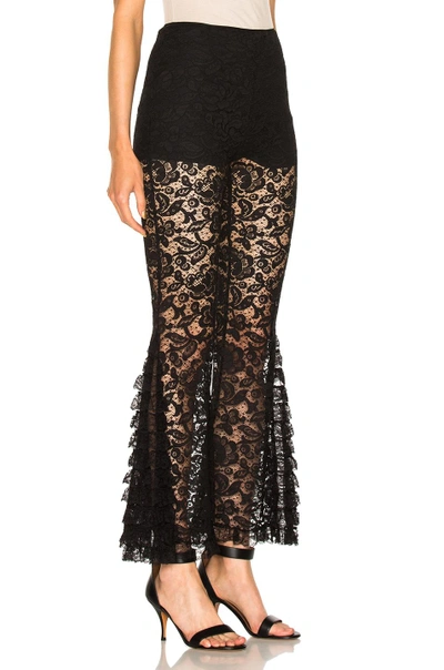 Shop Givenchy Lace Flared Pants In Black