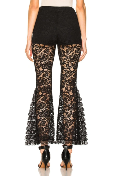 Shop Givenchy Lace Flared Pants In Black