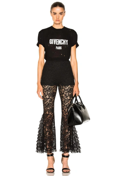 Shop Givenchy Lace Flared Trousers In Black