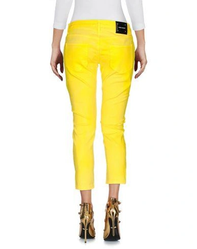 Shop Pierre Balmain Denim Pants In Yellow