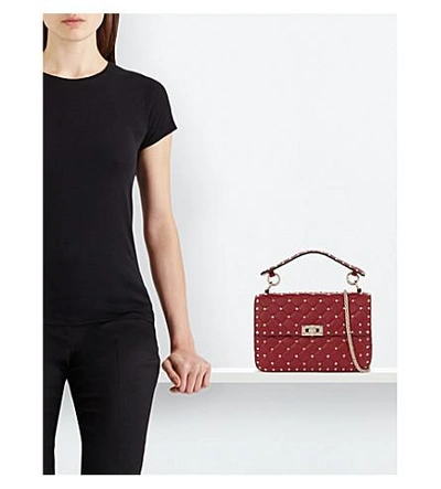Shop Valentino Rockstud Medium Leather Shoulder Bag In Red