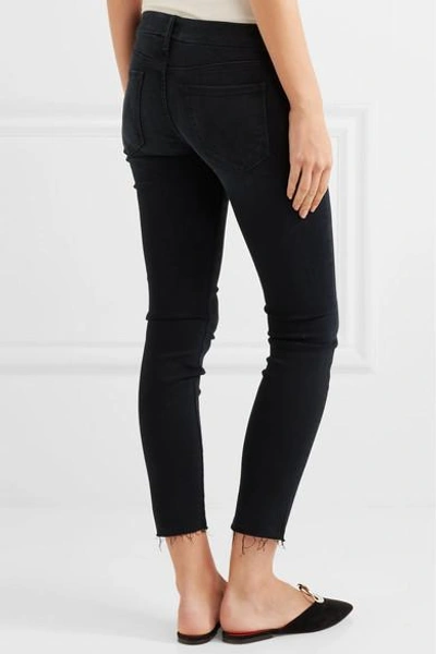 Shop Mother Looker Frayed High-rise Skinny Jeans In Black