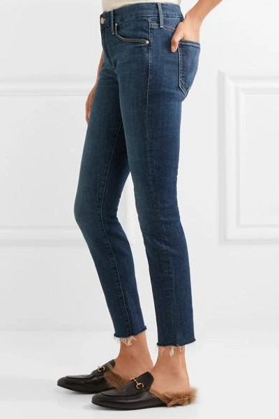 Shop Mother Looker Cropped Frayed Mid-rise Skinny Jeans In Dark Denim