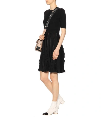 Shop Valentino Knitted Wool Dress In Black