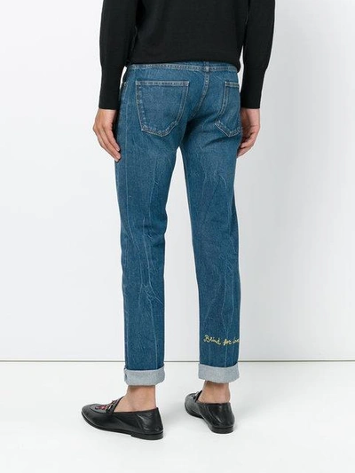 Shop Gucci Blind For Love Embroidered Jeans In 4111