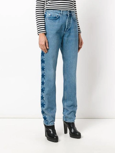 Shop Givenchy Star Patch Slouchy Jeans In 452