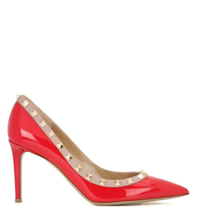 Shop Valentino Rockstud Patent Leather Pumps In Red