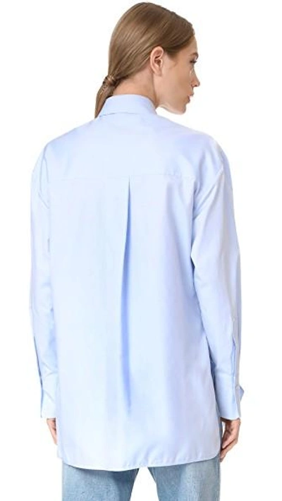 Shop Victoria Victoria Beckham Asymmetrical Bow Shirt In Oxford Blue