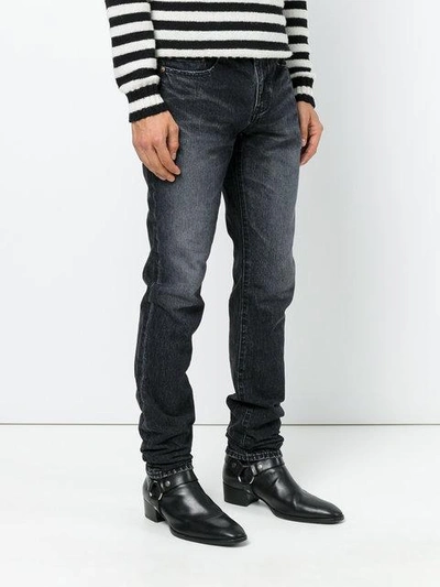 Shop Saint Laurent Classic Skinny Jeans In Black