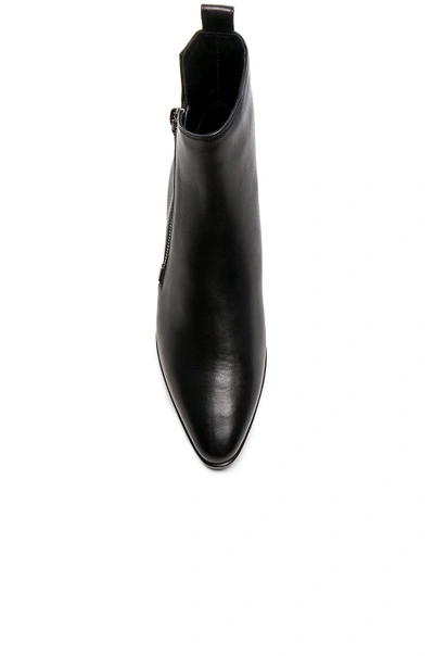 Shop Saint Laurent Leather Rock Zip Boots In Black