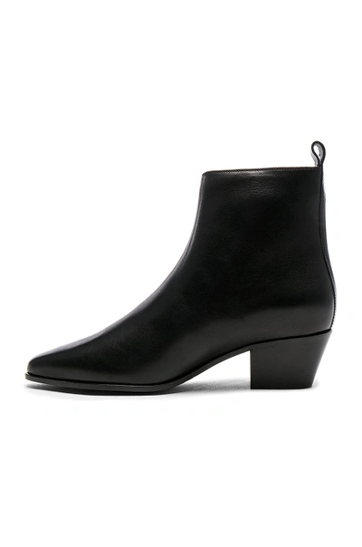 Shop Saint Laurent Leather Rock Zip Boots In Black