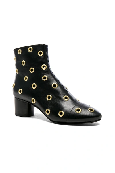 Shop Isabel Marant Eyelet Leather Danay Ankle Boots In Black
