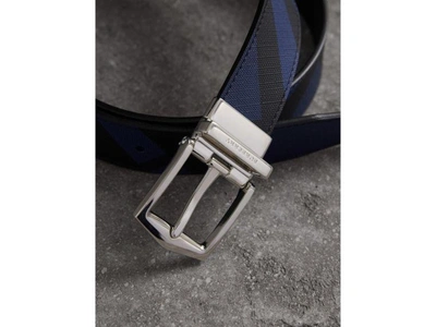 Shop Burberry Reversible London Check And Leather Belt In Bright Lapis/black