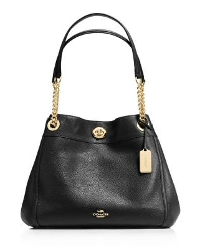 Shop Coach Turnlock Edie Shoulder Bag In Pebble Leather In Black/light Gold