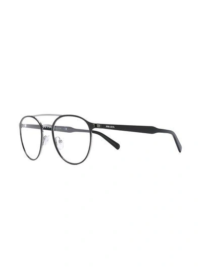 Shop Prada Round Frame Glasses In Black