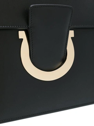 Shop Ferragamo Gancio Shoulder Bag In Black