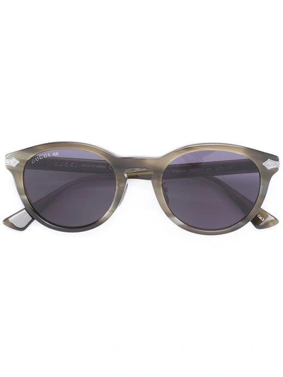 Shop Gucci Eyewear Line Effect Oval Sunglasses - Green