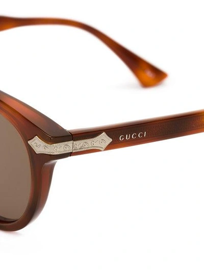 Shop Gucci Eyewear Tortoiseshell Oval Sunglasses - Brown