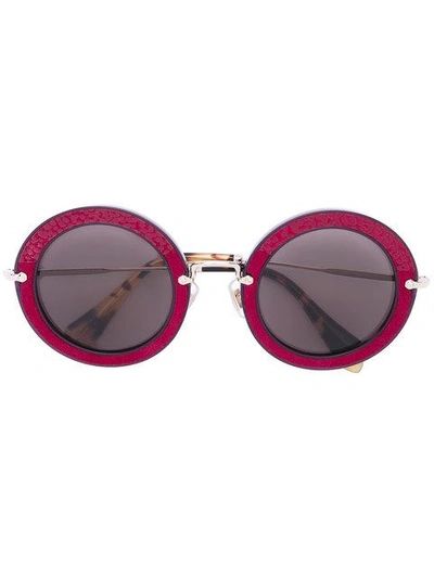 Shop Miu Miu Eyewear Noir Round Sunglasses - Brown