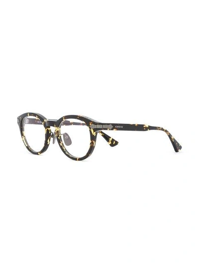 Shop Gucci Debossed Detailing Round-frame Glasses In Brown