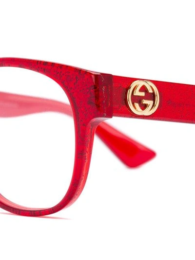 Shop Gucci Transparent Glitter Rectangular Glasses