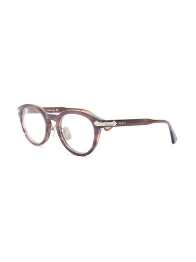 Shop Gucci Debossed Detailing Round-frame Glasses In Brown