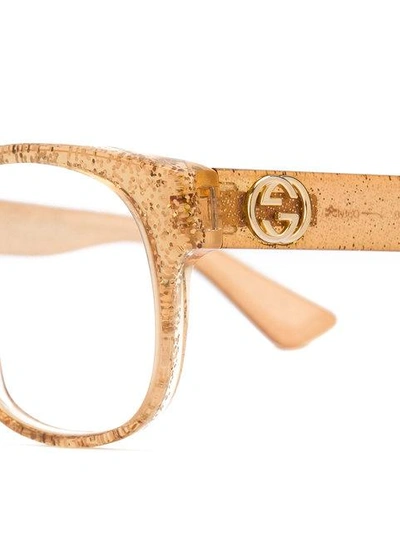Shop Gucci Transparent Glitter Rectangular Glasses
