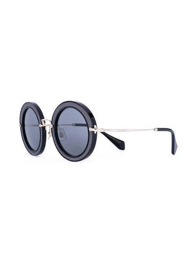 Shop Miu Miu Noir Round Sunglasses