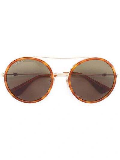 Shop Gucci Eyewear Round Frame Metal Sunglasses - Yellow