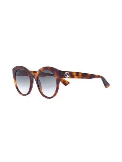 Shop Gucci Rounded Tortoiseshell Sunglasses In Brown