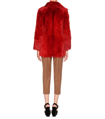 Shop Prada Fur Coat In Rosso