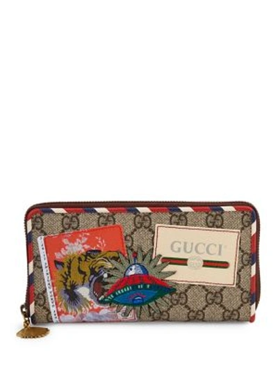 Shop Gucci Gg Courier Zip-around Wallet In Beige Multicolor