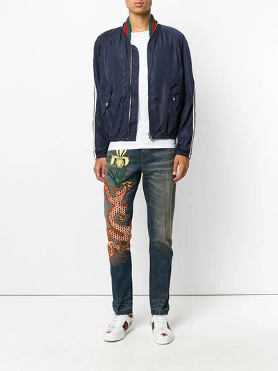 Shop Gucci Stonewashed Denim Jeans In 4205