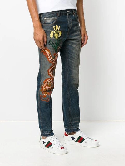 Shop Gucci Stonewashed Denim Jeans In 4205