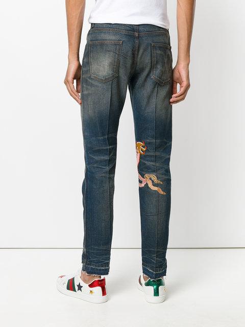 Gucci Embroidered Dragon Stone-Washed Tapered Jeans In Blue | ModeSens