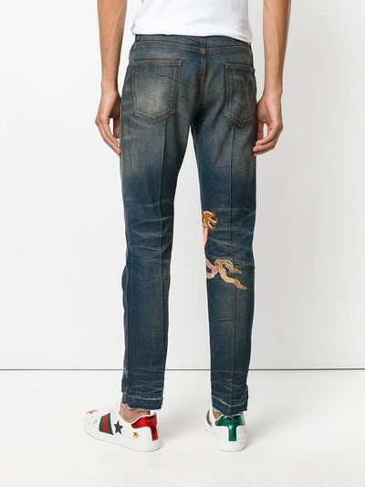 Shop Gucci Stonewashed Denim Jeans In 4205