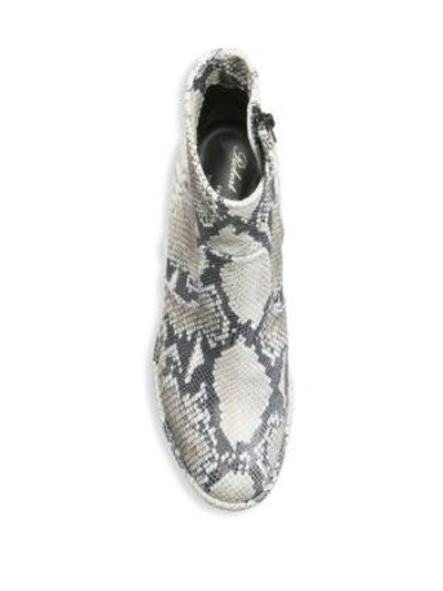Shop Robert Clergerie Almond Toe Snakeskin Booties In White