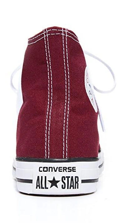 Shop Converse Chuck Taylor All Star High Top Sneakers In Burgundy