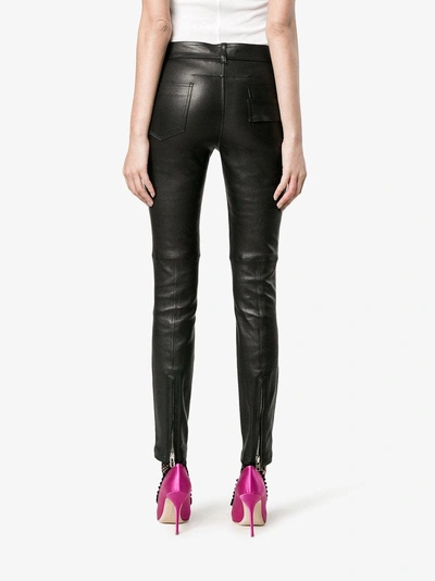 Shop Givenchy Skinny Leather Trousers In Black