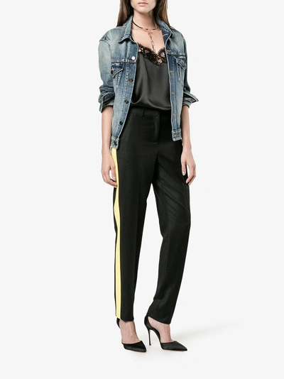 Shop Givenchy Side Striped Trousers In Black