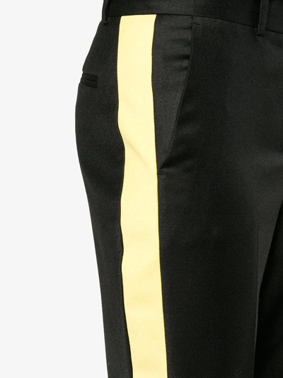 Shop Givenchy Side Striped Trousers In Black