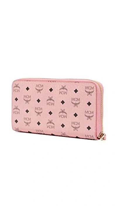 Shop Mcm Zip Around Wallet In Soft Pink