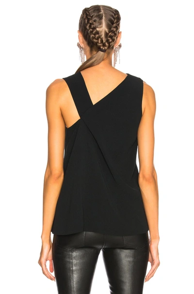 Shop Victoria Beckham Fluid Cady Sleeveless Knotted Top In Black