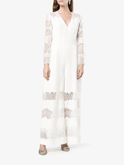 Shop Huishan Zhang V-neck Lace Jumpsuit In White