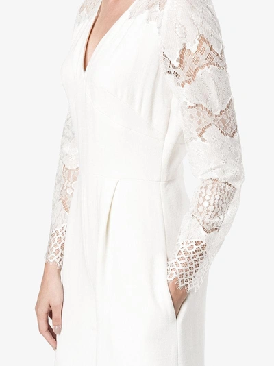 Shop Huishan Zhang V-neck Lace Jumpsuit In White