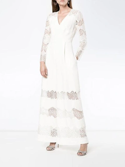 Shop Huishan Zhang V-neck Lace Jumpsuit In White