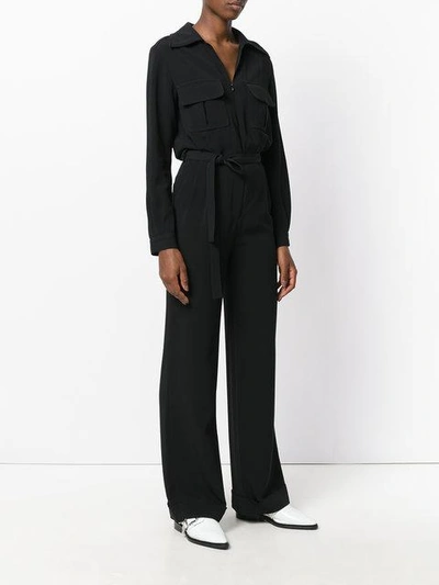 Shop Stella Mccartney Belted Jumpsuit In Black