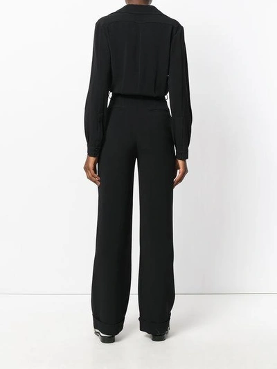 Shop Stella Mccartney Belted Jumpsuit In Black