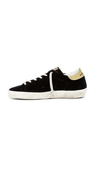 Shop Golden Goose Superstar Velvet Sneakers In Black/white